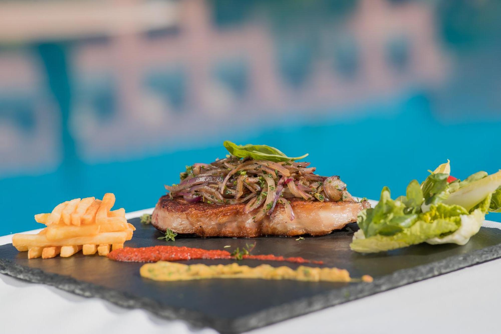Grand Mogador Agdal & Spa Μαρακές Εξωτερικό φωτογραφία A steak prepared with the method of cooking